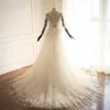 Illusion Champagne See-through Wedding Dresses 2018 A-Line / Princess Lace Appliques High Neck Long Sleeve Chapel Train Wedding