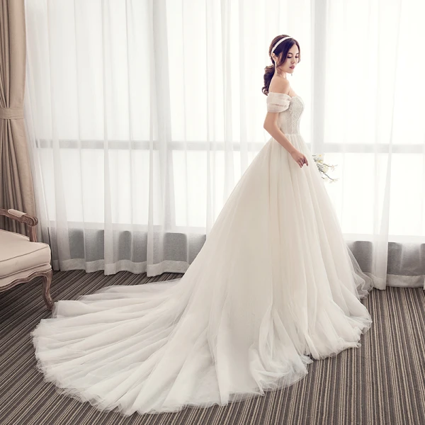 Élégant Champagne Robe De Mariée 2019 Princesse De l'épaule En Dentelle Perlage Sans Manches Dos Nu Chapel Train