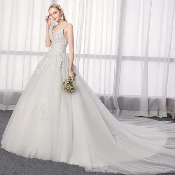 Élégant Ivoire Robe De Mariée 2019 Princesse Bretelles Spaghetti En Dentelle Fleur Sans Manches Dos Nu Royal Train