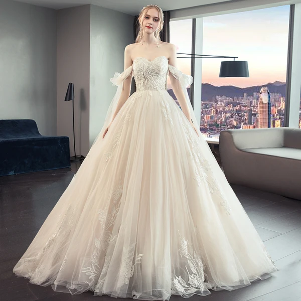 Chic / Belle Champagne Robe De Mariée 2019 Princesse Bustier Perlage En Dentelle Fleur Sans Manches Dos Nu Noeud Royal Train