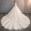 Élégant Champagne Robe De Mariée 2019 Princesse De l'épaule Perlage Perle Cristal Paillettes En Dentelle Fleur Manches Courtes Dos Nu Royal Train