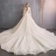 Audrey Hepburn Style Champagne Wedding Dresses 2019 Ball Gown 3/4 Sleeve Beading Sequins Crystal Flower Lace Off-The-Shoulder Backless Royal Train