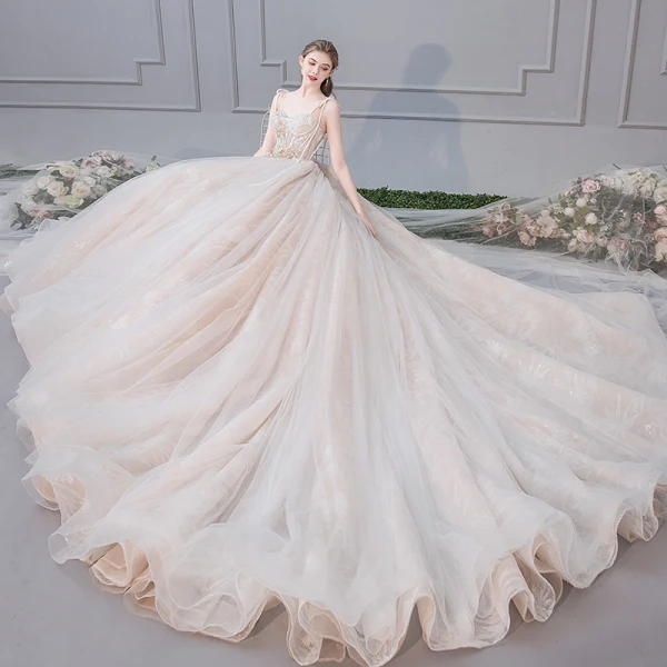 Elegant Champagne Wedding Dresses 2019 Ball Gown Spaghetti Straps Bow Beading Rhinestone Pearl Lace Flower Appliques Sleeveless Backless Royal Train