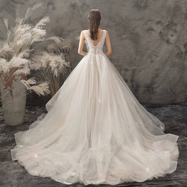 Élégant Champagne Robe De Mariée 2019 Princesse Encolure Dégagée Appliques Cristal En Dentelle Fleur Sans Manches Dos Nu Chapel Train