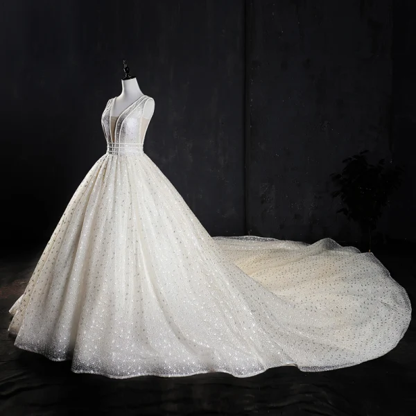 Meilleur Ivoire Fait main Perlage Robe De Mariée 2019 Princesse V-Cou Glitter Tulle Sans Manches Dos Nu Cathedral Train