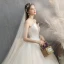 Charmant Champagne Robe De Mariée 2019 Princesse Bustier Noeud Sans Manches Dos Nu Cathedral Train