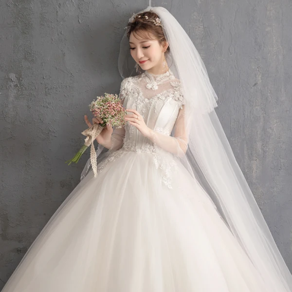 Élégant Champagne Robe De Mariée 2019 Princesse Col Haut Appliques En Dentelle Fleur Perlage Perle Paillettes Manches Longues Dos Nu Longue