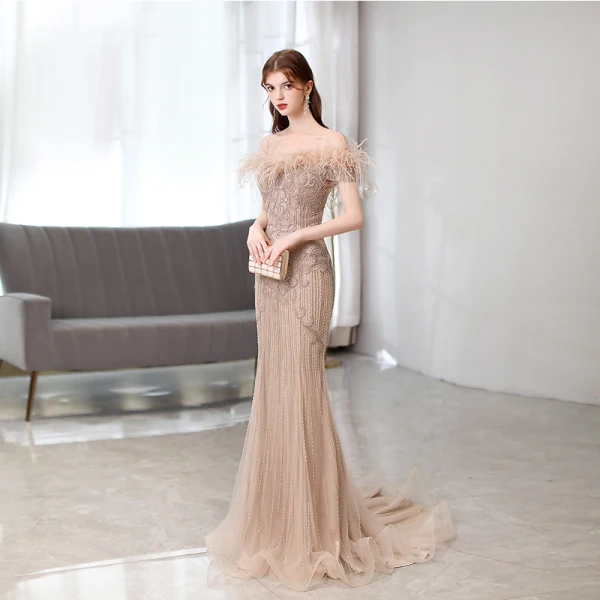 Haut de Gamme Fabuleux Champagne Fait main Perlage Faux Diamant Robe De Soirée 2021 Trompette / Sirène De l'épaule Gland Sans Manches Train De Balayage Robe De Ceremonie