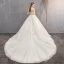 Elegant Ivory Wedding Dresses 2019 Ball Gown Spaghetti Straps Beading Sequins Lace Flower Sleeveless Backless Cathedral Train