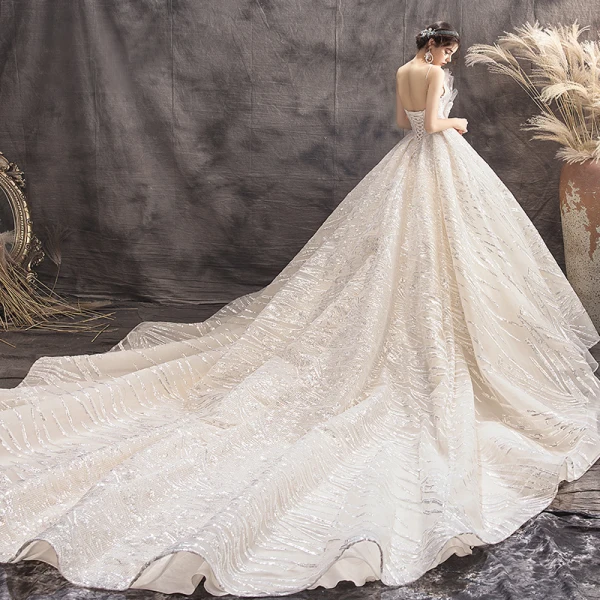 Luxury / Gorgeous Champagne Wedding Dresses 2019 Ball Gown Spaghetti Straps Sequins Sleeveless Backless Bow Royal Train