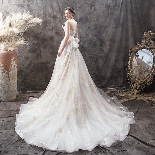 Chic / Beautiful Champagne Wedding Dresses 2019 A-Line / Princess Strapless Pearl Lace Flower Backless Bow Sleeveless Court Train