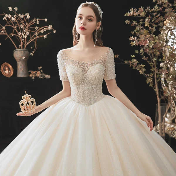 Modern / Fashion Champagne Wedding Dresses 2021 Ball Gown Scoop Neck Beading Pearl Sequins Short Sleeve Backless Royal Train Wedding