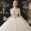 Modern / Fashion Champagne Wedding Dresses 2021 Ball Gown Scoop Neck Beading Pearl Sequins Short Sleeve Backless Royal Train Wedding