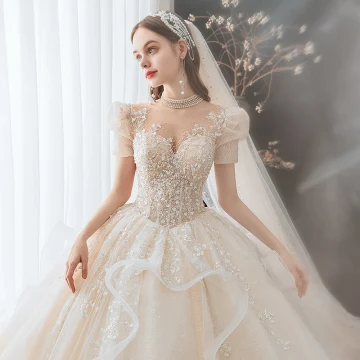 Moderne Mode Champagne Robe De Mariée 2021 Robe Boule Encolure Dégagée Perlage Paillettes Perle En Dentelle Fleur Appliques Manches Courtes Dos Nu Royal Train Mariage