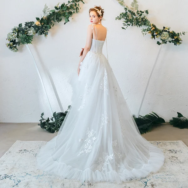 Chic Haute Basse Été Ivoire Plage Robe De Mariée 2019 Princesse Bretelles Spaghetti Perlage Paillettes Appliques En Dentelle Fleur Sans Manches Dos Nu Train De Balayage