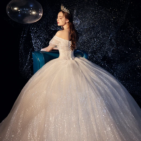 Fabulous Champagne Wedding Dresses 2019 Ball Gown Off-The-Shoulder Sequins Beading Tassel Short Sleeve Backless Royal Train