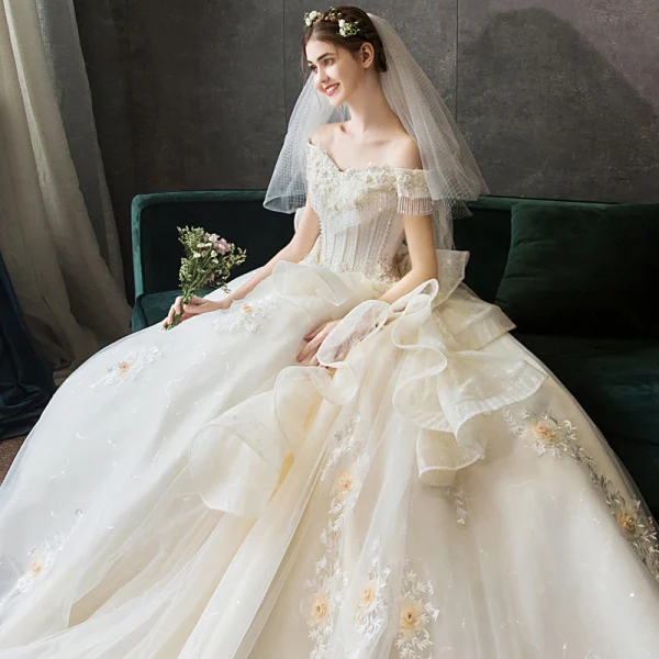 Luxury / Gorgeous Champagne Wedding Dresses 2019 Ball Gown Off-The-Shoulder Beading Pearl Crystal Tassel Lace Flower Short Sleeve Backless Cascading Ruffles Cathedral Train