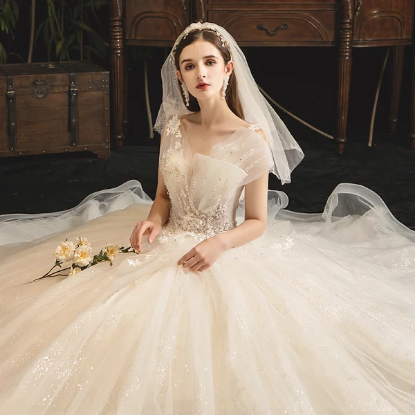 Classy Champagne Wedding Dresses 2019 Ball Gown V-Neck Sequins Lace Flower Sleeveless Backless Court Train