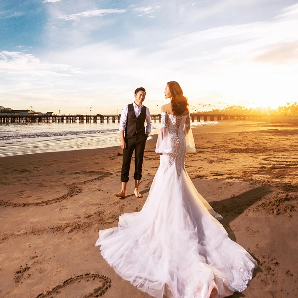 Charming Ivory Wedding Dresses 2023 Trumpet / Mermaid Off-The-Shoulder Lace Flower Long Sleeve Backless Chapel Train