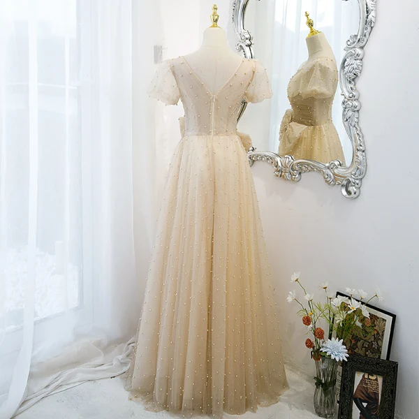 Élégant Champagne Robe De Bal Princesse 2021 V-Cou Noeud Paillettes Perle Manches Courtes Dos Nu Longue Robe De Ceremonie