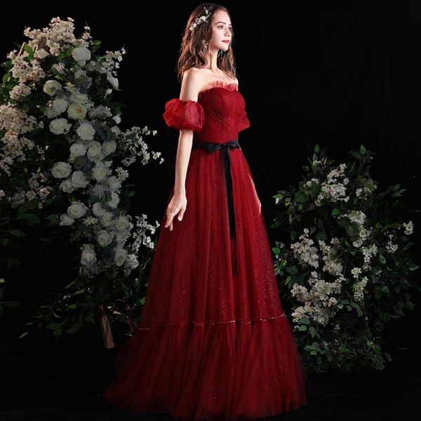 Charming Burgundy Glitter Prom Dresses 2021 A-Line / Princess Off-The-Shoulder Puffy Short Sleeve Sash Floor-Length / Long Prom Formal Dresses