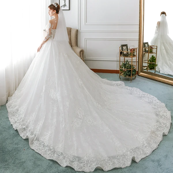 Charmant Ivoire Transparentes Robe De Mariée 2018 Princesse Encolure Dégagée 3/4 Manches Dos Nu Perlage Appliques En Dentelle Volants Royal Train