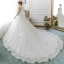 Charmant Ivoire Transparentes Robe De Mariée 2018 Princesse Encolure Dégagée 3/4 Manches Dos Nu Perlage Appliques En Dentelle Volants Royal Train