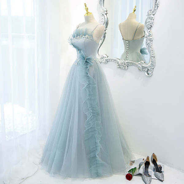 Élégant Bleu Ciel Volants Robe De Bal 2021 Princesse Bretelles Spaghetti Perlage Perle Paillettes Sans Manches Dos Nu Longue Robe De Ceremonie