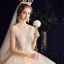Charming Champagne Wedding Dresses 2020 Ball Gown Ruffle V-Neck Beading Pearl Lace Appliques Sequins Sleeveless Backless Royal Train