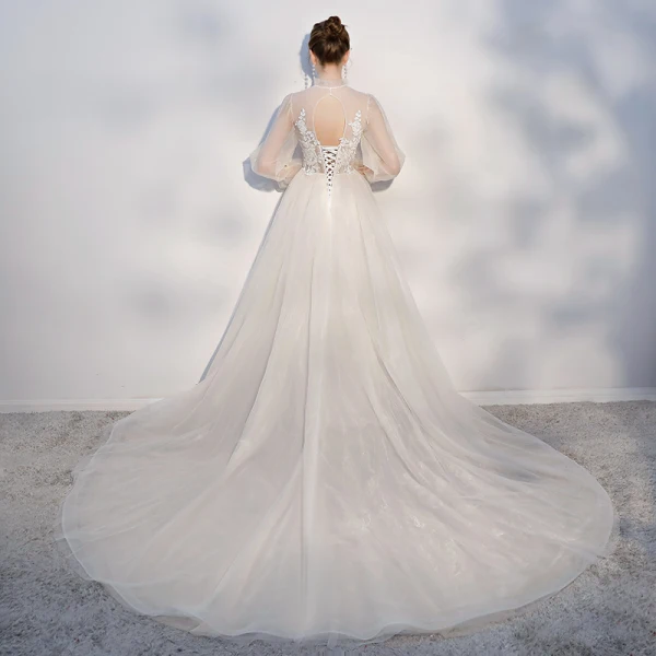 Elegant Champagne Beach Wedding Dresses 2018 A-Line / Princess Lace Appliques Scoop Neck Backless Long Sleeve Chapel Train Wedding