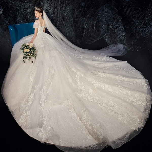 High-end Ivory Wedding Dresses 2020 Ball Gown V-Neck Beading Pearl Sequins Lace Flower Appliques Short Sleeve Backless Royal Train