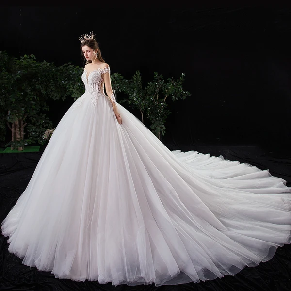 Charmant Ivoire Robe De Mariée 2020 Princesse Encolure Dégagée Perlage Perle Paillettes En Dentelle Fleur Manches Longues Cathedral Train