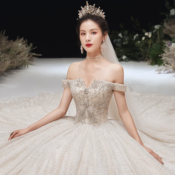 Luxury / Gorgeous Champagne Glitter Wedding Dresses 2020 Ball Gown Off-The-Shoulder Beading Rhinestone Lace Flower Sleeveless Backless Cathedral Train