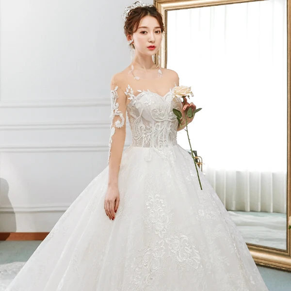 Charmant Ivoire Transparentes Robe De Mariée 2018 Princesse Encolure Dégagée 3/4 Manches Dos Nu Perlage Appliques En Dentelle Volants Royal Train