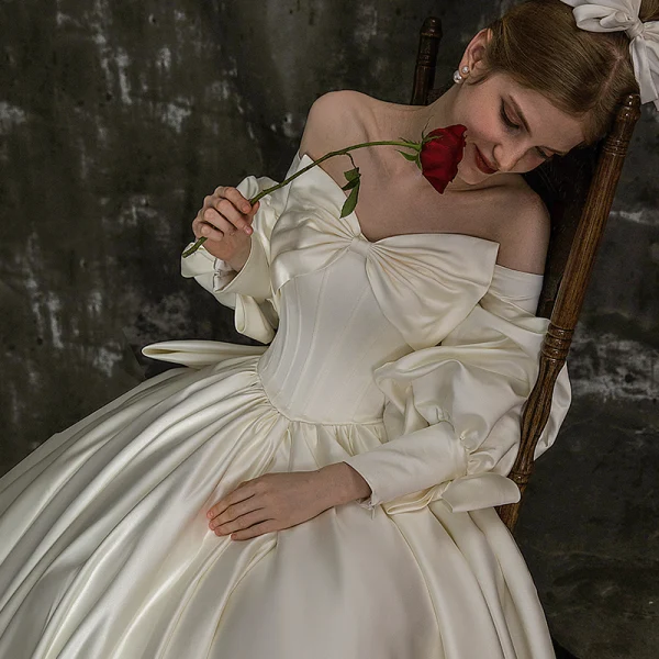 High-end Ivory Bow Satin Wedding Dresses 2022 Ball Gown Off-The-Shoulder Puffy Long Sleeve Backless Royal Train Wedding