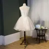 Chic / Beautiful Ivory Homecoming Graduation Dresses 2020 A-Line / Princess Spaghetti Straps Glitter Star Sleeveless Backless Knee-Length Formal Dresses