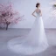 Abordable Blanche Robe De Mariée 2020 Princesse V-Cou Faux Diamant En Dentelle Fleur Appliques Sans Manches Dos Nu Tribunal Train