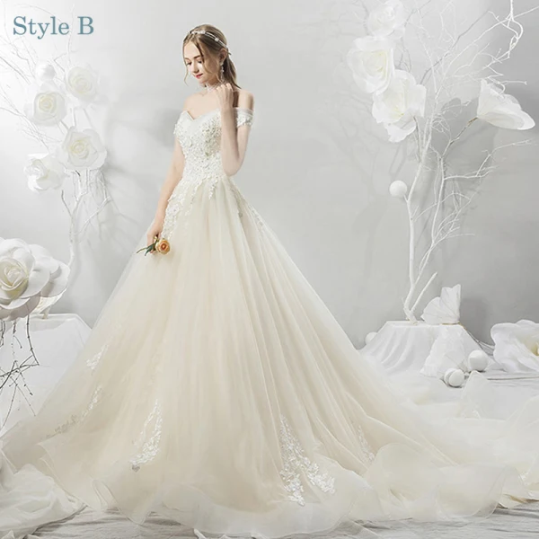 Elegant Champagne Wedding Dresses 2018 Ball Gown Lace Appliques Beading Pearl Off-The-Shoulder Backless Short Sleeve Cathedral Train Wedding