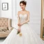 Charmant Ivoire Transparentes Robe De Mariée 2018 Princesse Encolure Dégagée 3/4 Manches Dos Nu Perlage Appliques En Dentelle Volants Royal Train