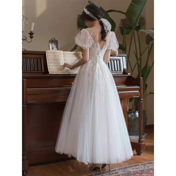 Élégant Ivoire Robe De Mariée 2021 Princesse Encolure Dégagée Perle En Dentelle Fleur Manches Courtes Dos Nu Longue Mariage