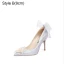 Charmig Glittrande Silver Rhinestone Pärla Brudskor 2021 Rosett Läder 10 cm Stilettklackar Spetsiga Bröllop Högklackade Pumps