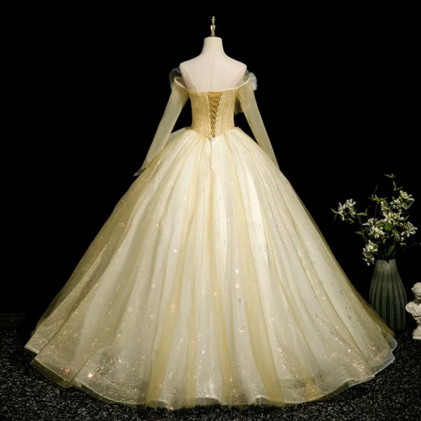 Elegant Yellow Appliques Prom Dresses 2025 Ball Gown Off-The-Shoulder Long Sleeve Backless Floor-Length / Long Formal Dresses