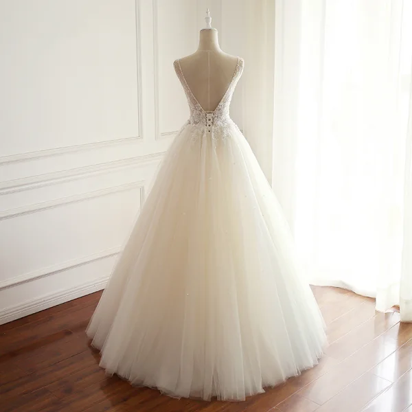 Chic / Belle Champagne Robe De Mariée 2018 Princesse Perlage Paillettes En Dentelle V-Cou Dos Nu Sans Manches Longue Mariage