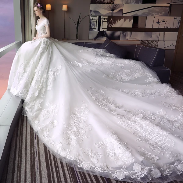 Luxury / Gorgeous Ivory Wedding Dresses 2018 Ball Gown Appliques Lace Flower Sequins V-Neck Backless Short Sleeve Royal Train Wedding