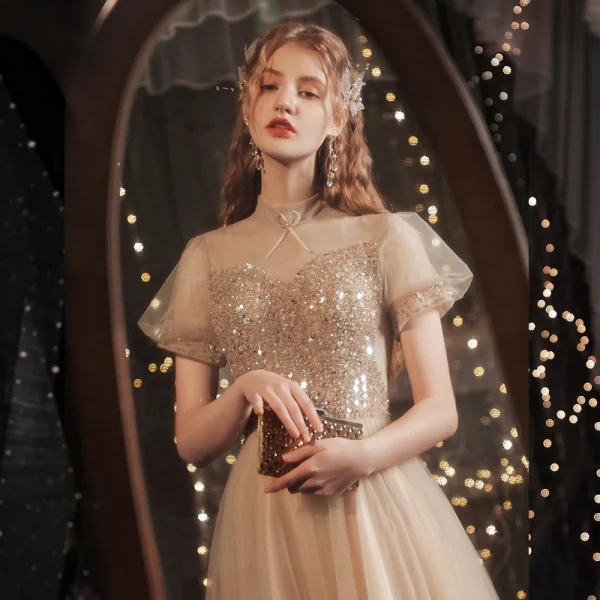 Charmant Doré Étoile Paillettes Robe De Bal 2021 Princesse Col Haut Perlage Manches Courtes Dos Nu Noeud Longue Promo Robe De Ceremonie