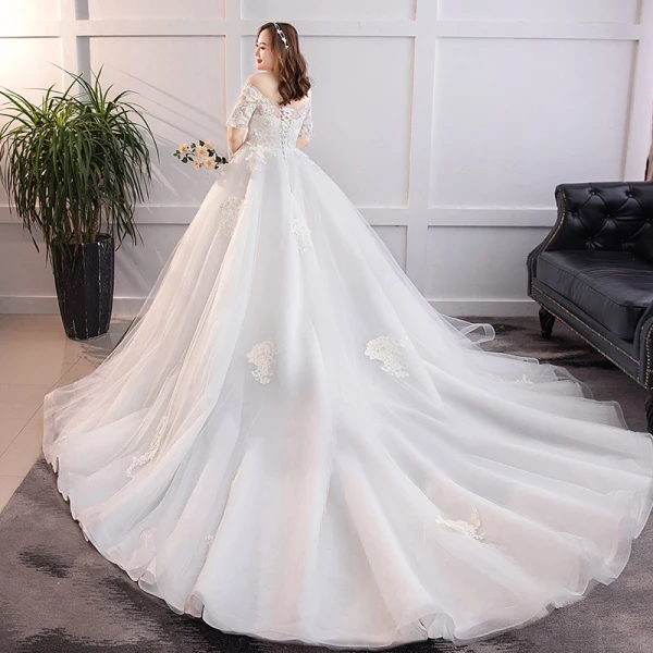 Klassisch Elegante Weiß Übergröße Brautkleider / Hochzeitskleider 2019 A Linie Spitze Tülle Applikationen Rückenfreies Bandeau Kapelle-Schleppe Hochzeit