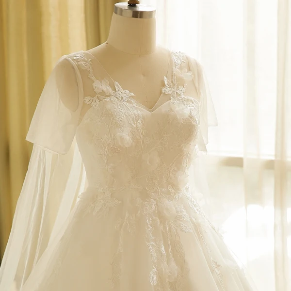 Unique Blanche Robe De Mariée 2017 Princesse V-Cou Tulle Perlage Appliques Dos Nu Mariage