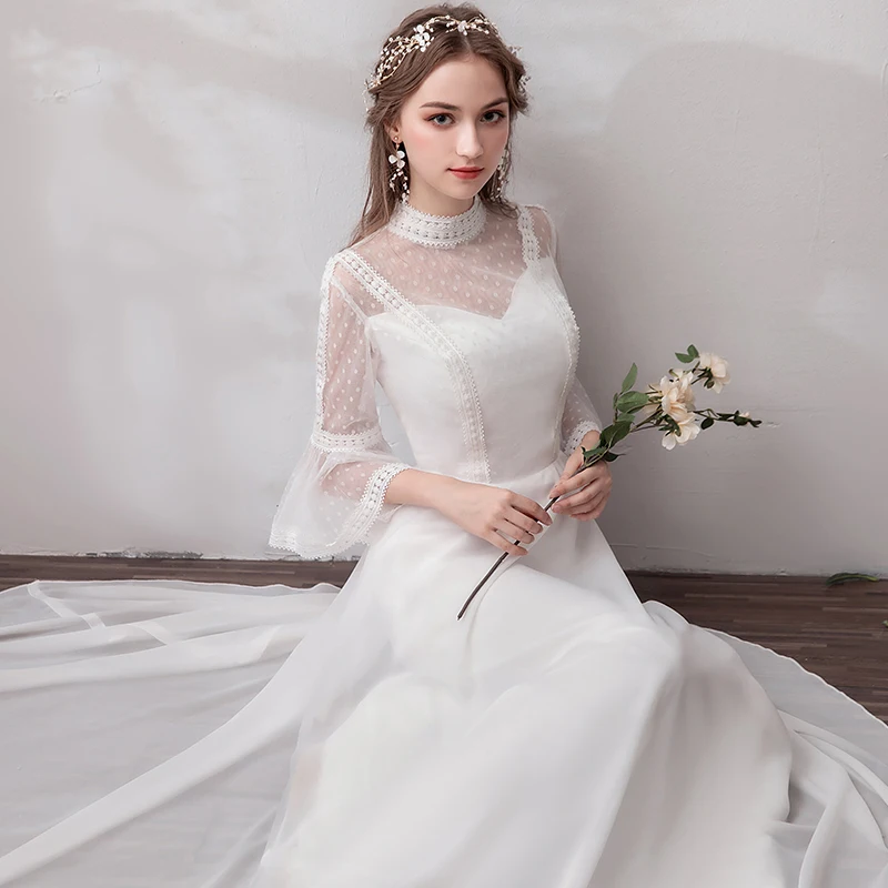 Modern Fashion White Evening Dresses 2019 A Line Princess Long Sleeve Lace Tulle High Neck Appliques Backless Beach Church Formal Dresses Modern Fashion White Evening Dresses 2019 A Line Princess Long Sleeve Lace Tulle High Neck Appliques Backless Beach Church Formal Dresses