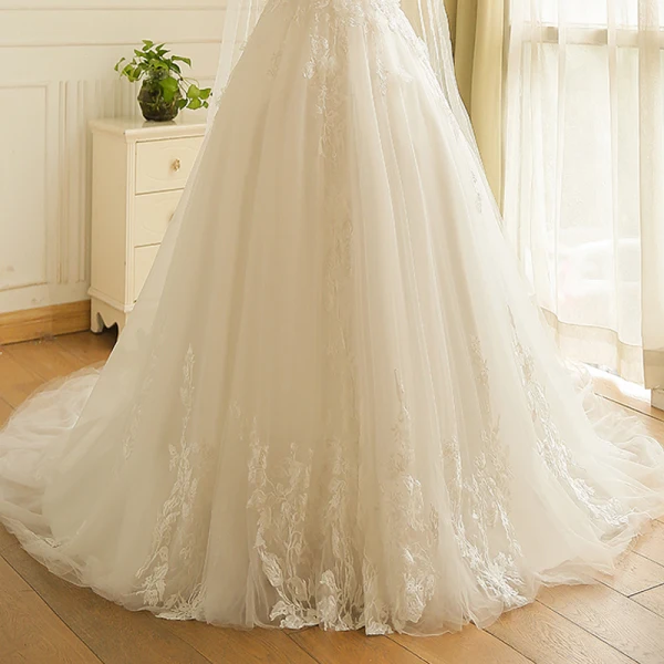 Unique Blanche Robe De Mariée 2017 Princesse V-Cou Tulle Perlage Appliques Dos Nu Mariage