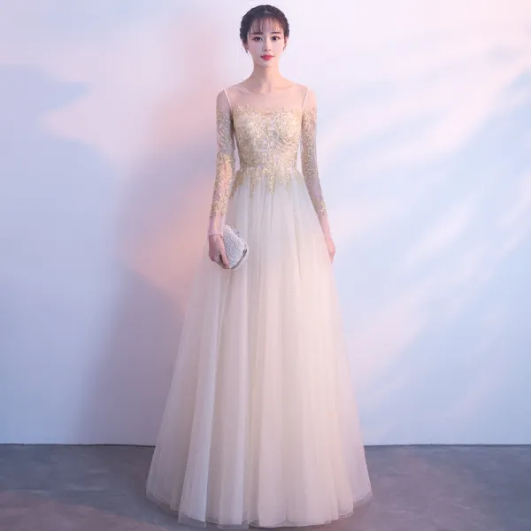 Eleganckie Szampan Przezroczyste Sukienki Wieczorowe 2018 Princessa Wycięciem Długie Rękawy Aplikacje Z Koronki Długie Wzburzyć Sukienki Wizytowe
